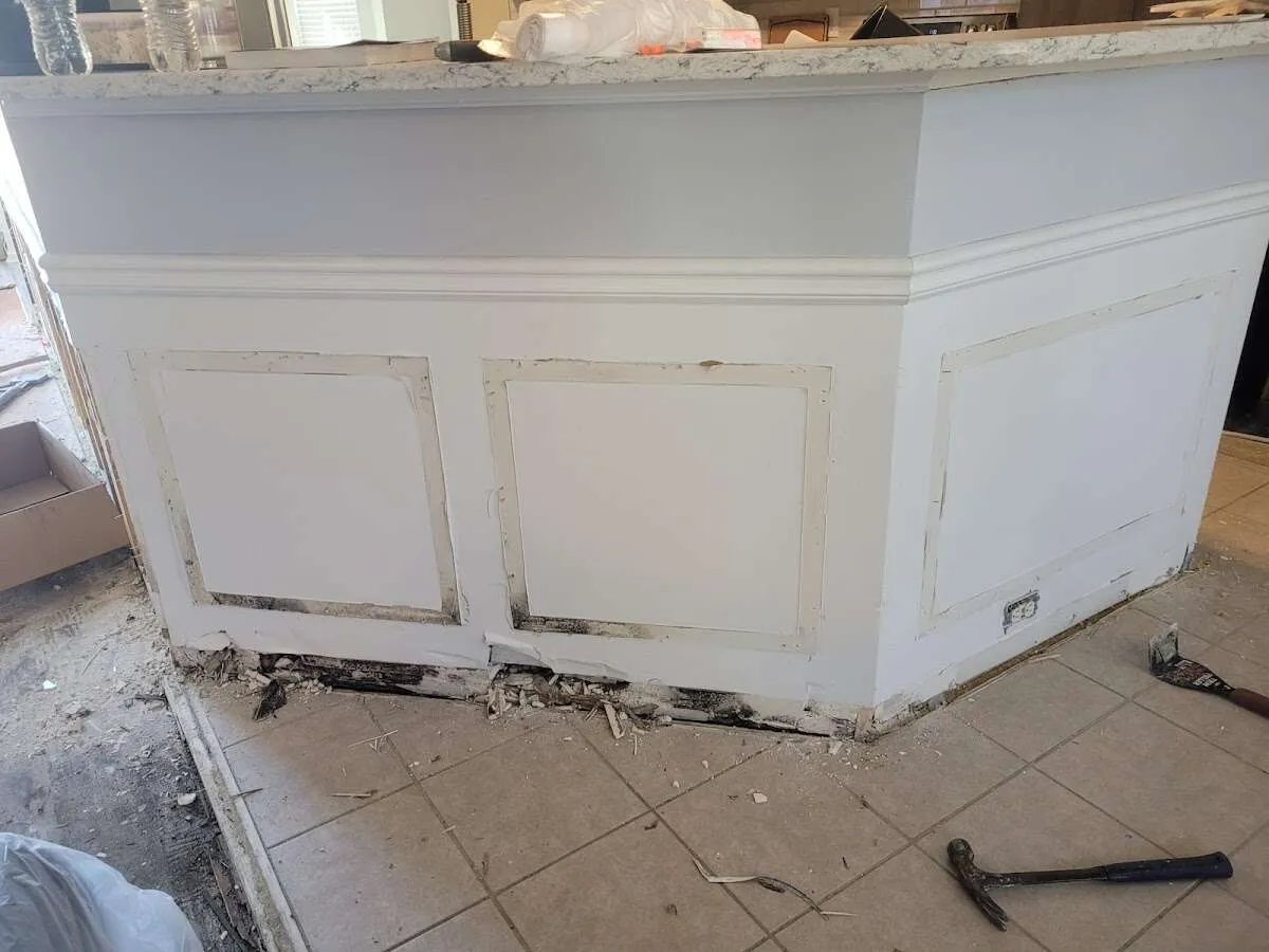 Water damage and mold on kitchen during Storm Damage Restoration in Ada